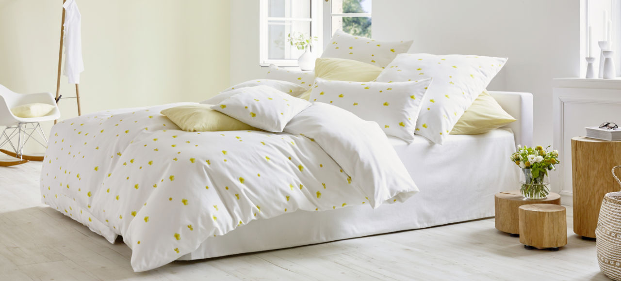 Bio-Bettwäsche Satin aus Bio-Baumwolle mit Design Butterblume in Gelb und Weiß ohne optische Aufheller